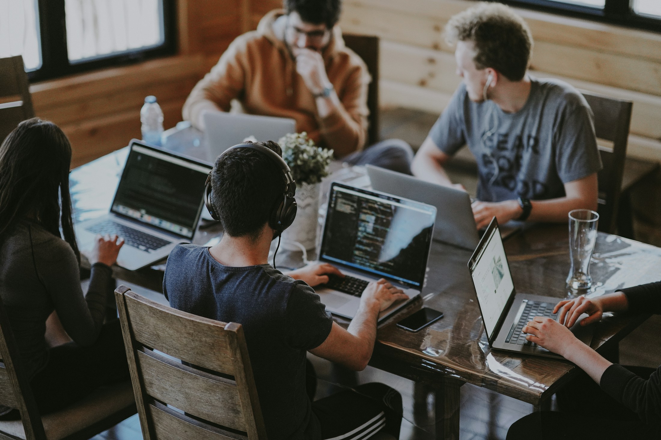A team collaborating around a table during a workshop